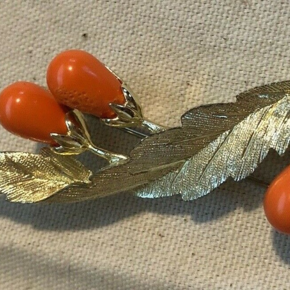 Vintage Gold-tone brooch with coral color beads
